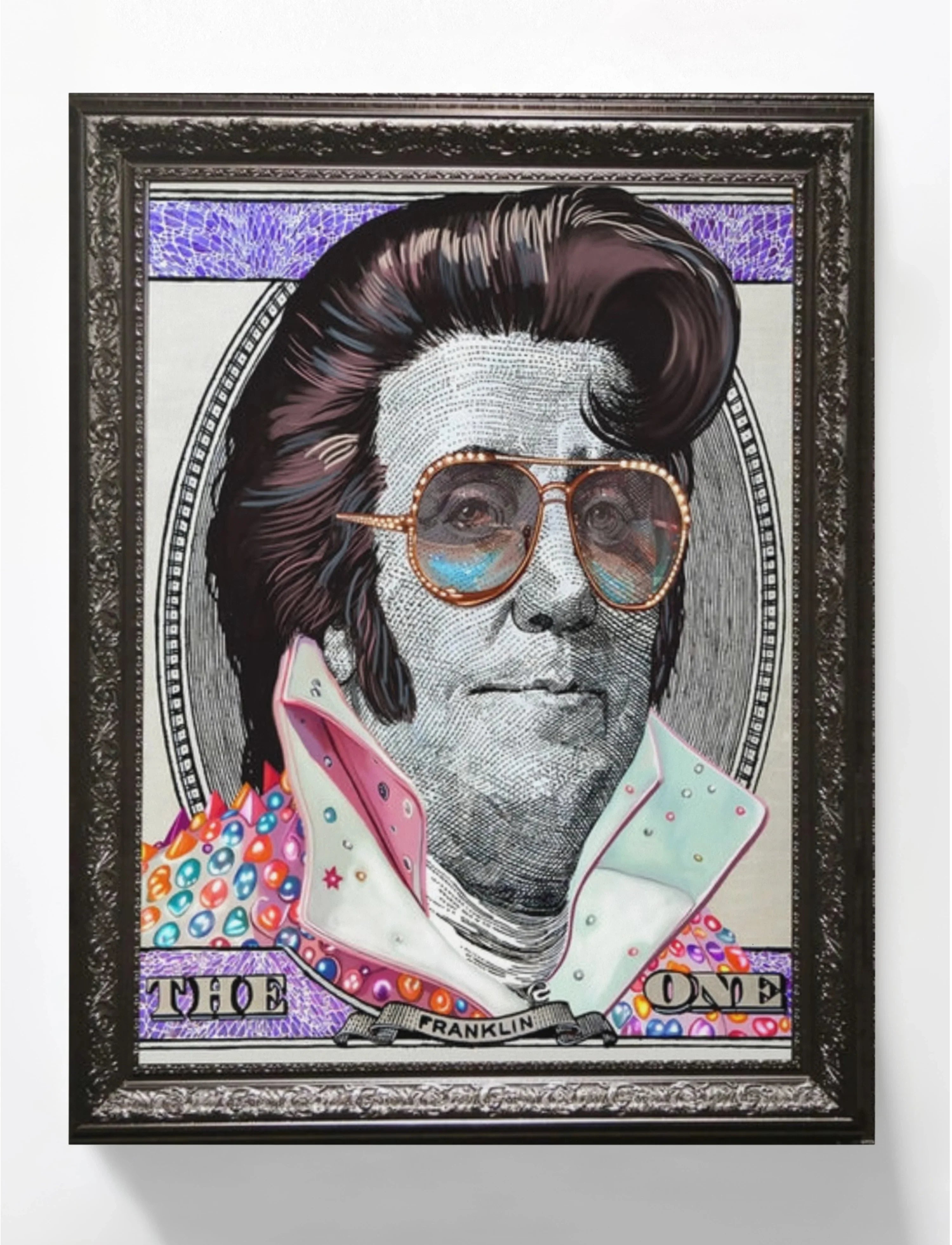 Framed artwork of Benjamin Franklin styled as Elvis Presley with pompadour, sunglasses, and colorful studded collar